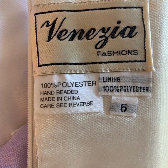 This is a never worn..strapless size 6 fully lined and proper pearl beading. - Picture 2 of 3